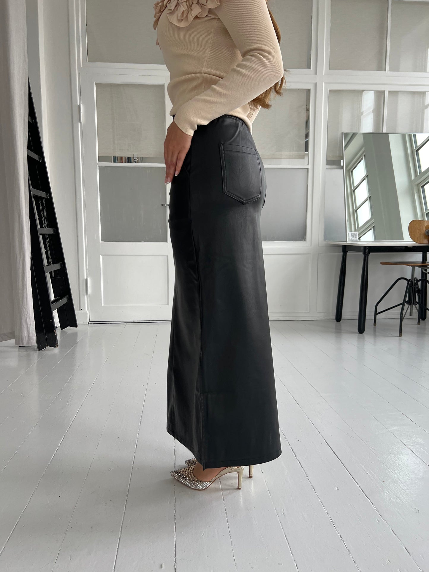 Its may black skirt