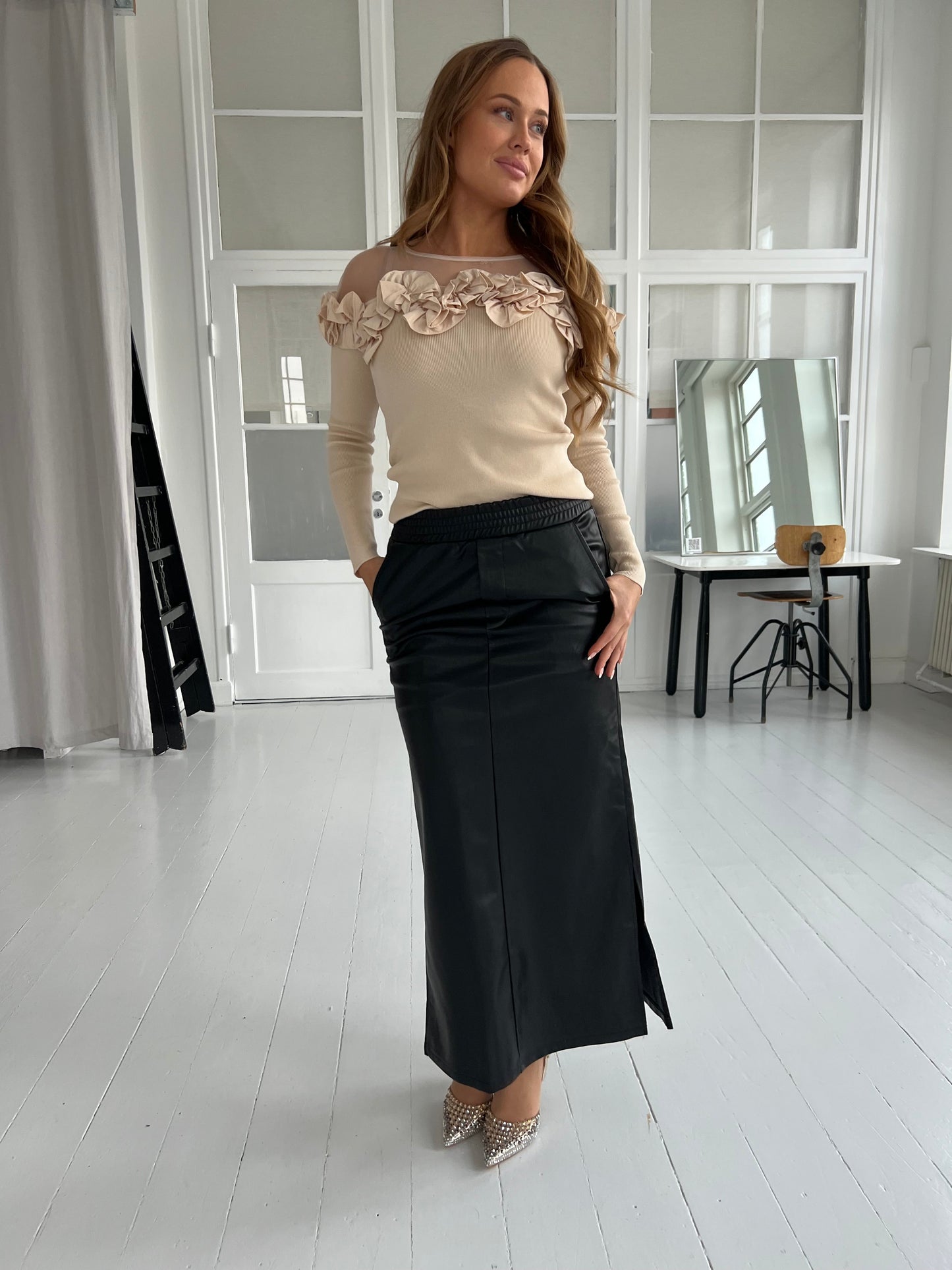 Its may black skirt