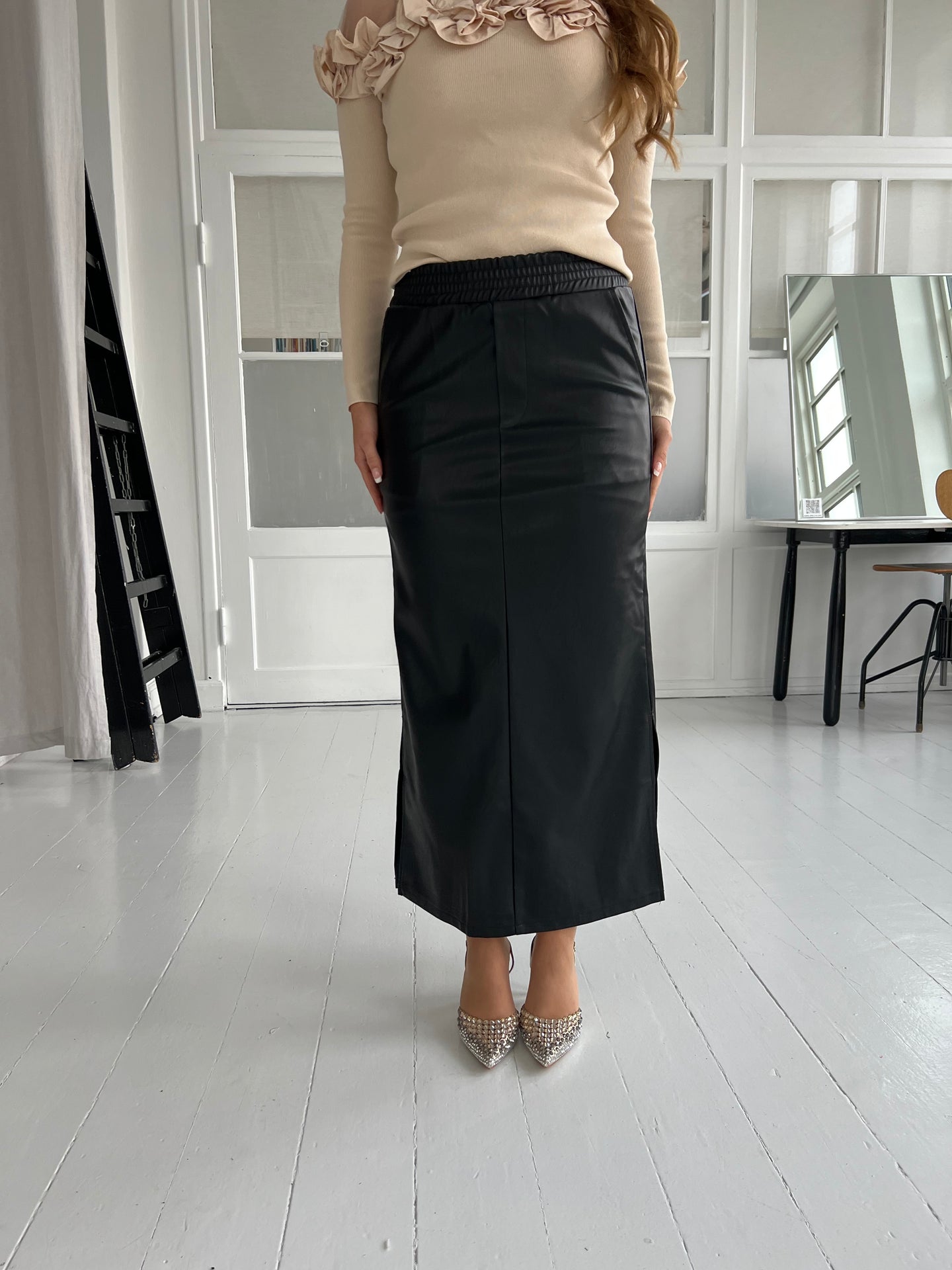 Its may black skirt