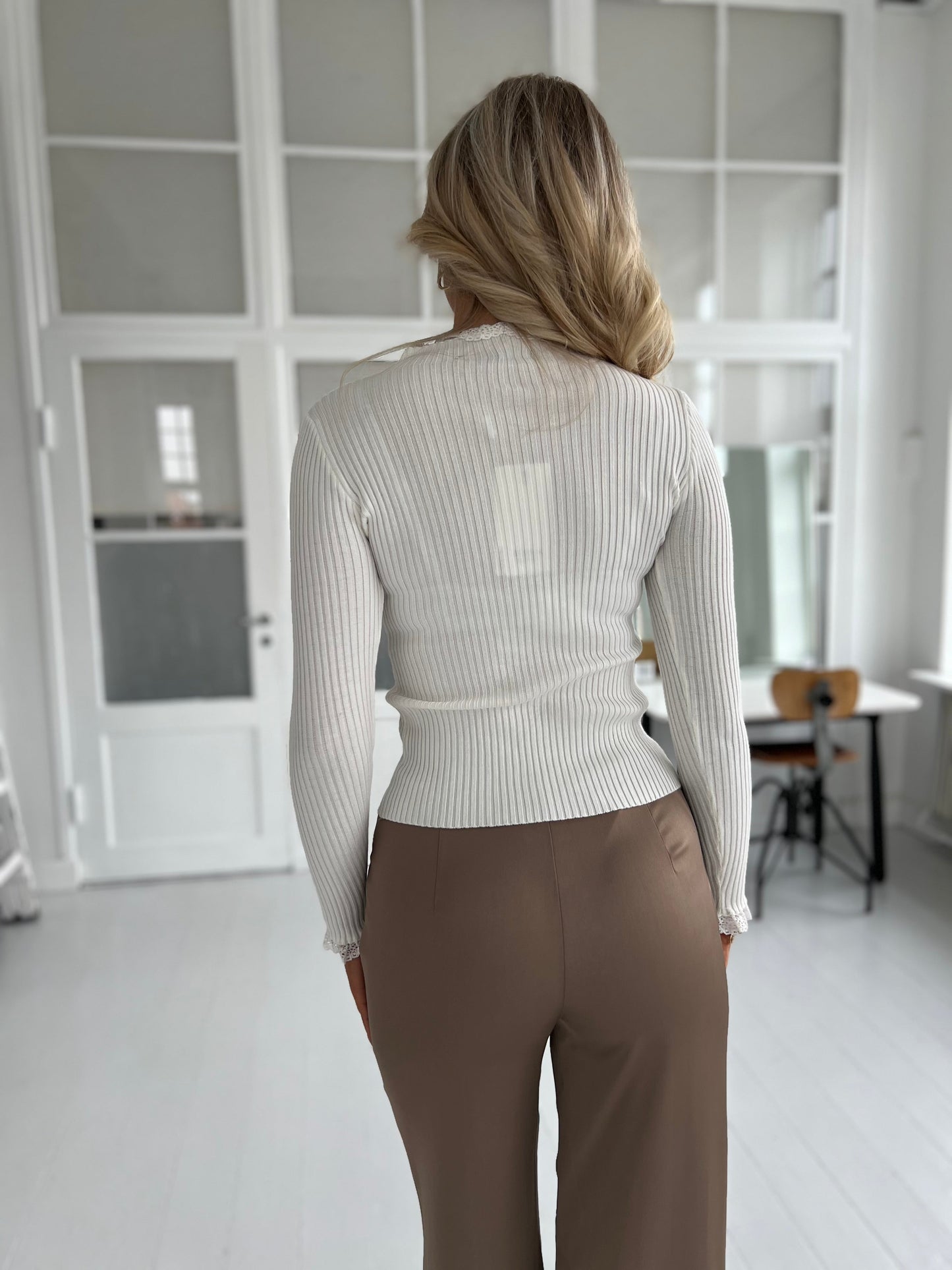 Its May beige turtleneck